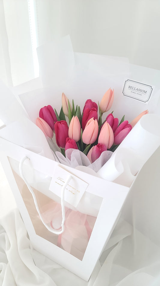 Valentine Tulip Bouquet with 15 vibrant red and pink tulips, hand-wrapped in luxurious gift design for romantic gifts and same-day delivery in Vancouver