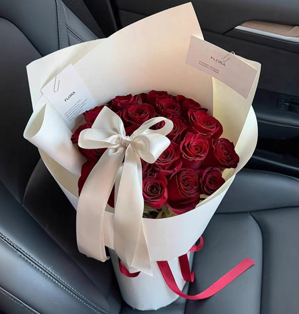Premium red rose arrangement with soft ribbon finish, perfect gift for Valentine’s Day or heartfelt moments, Vancouver delivery & pick‑up