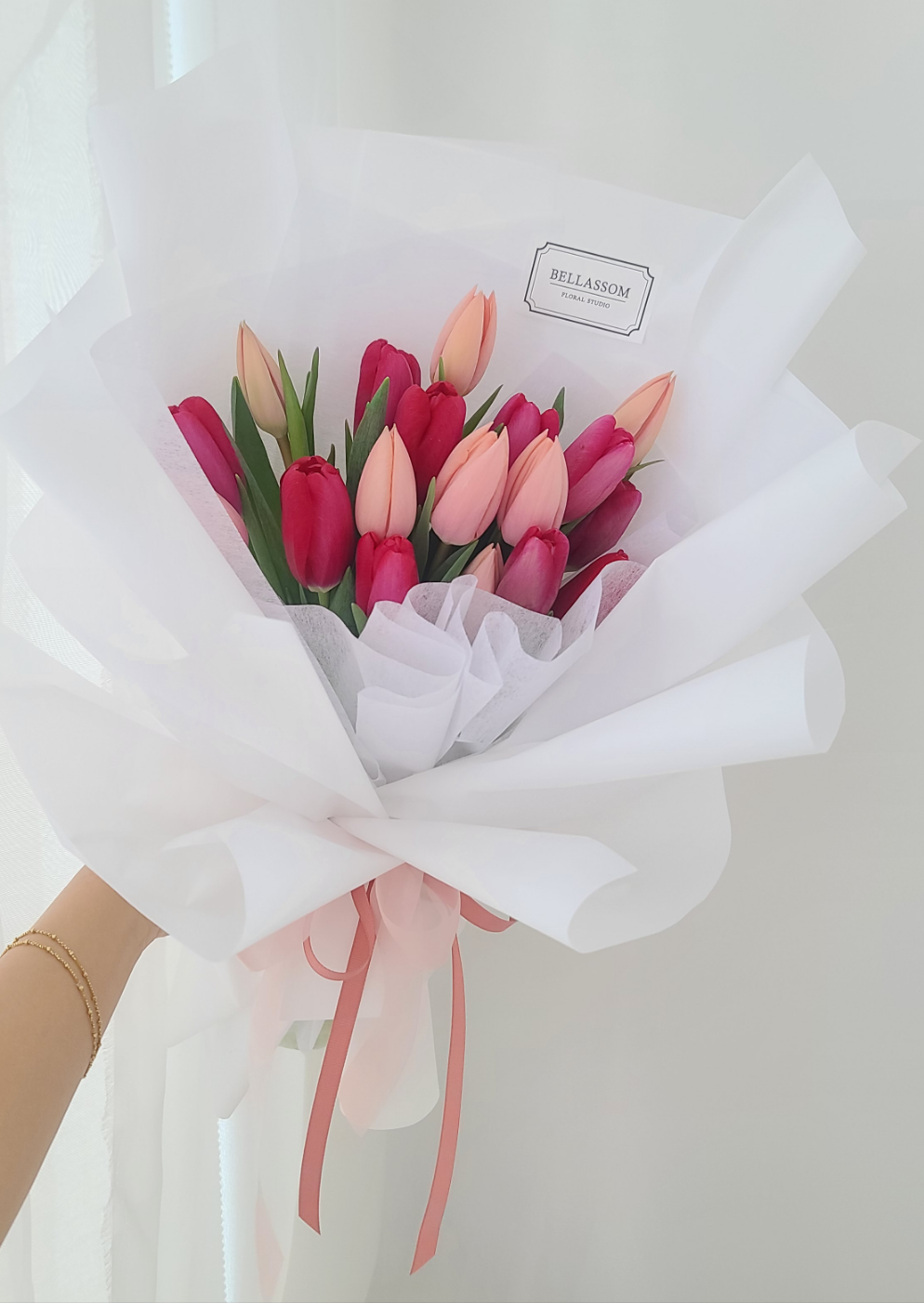 Hand-wrapped Valentine tulip bouquet with luxury gift design for anniversaries and romantic occasions in Vancouver