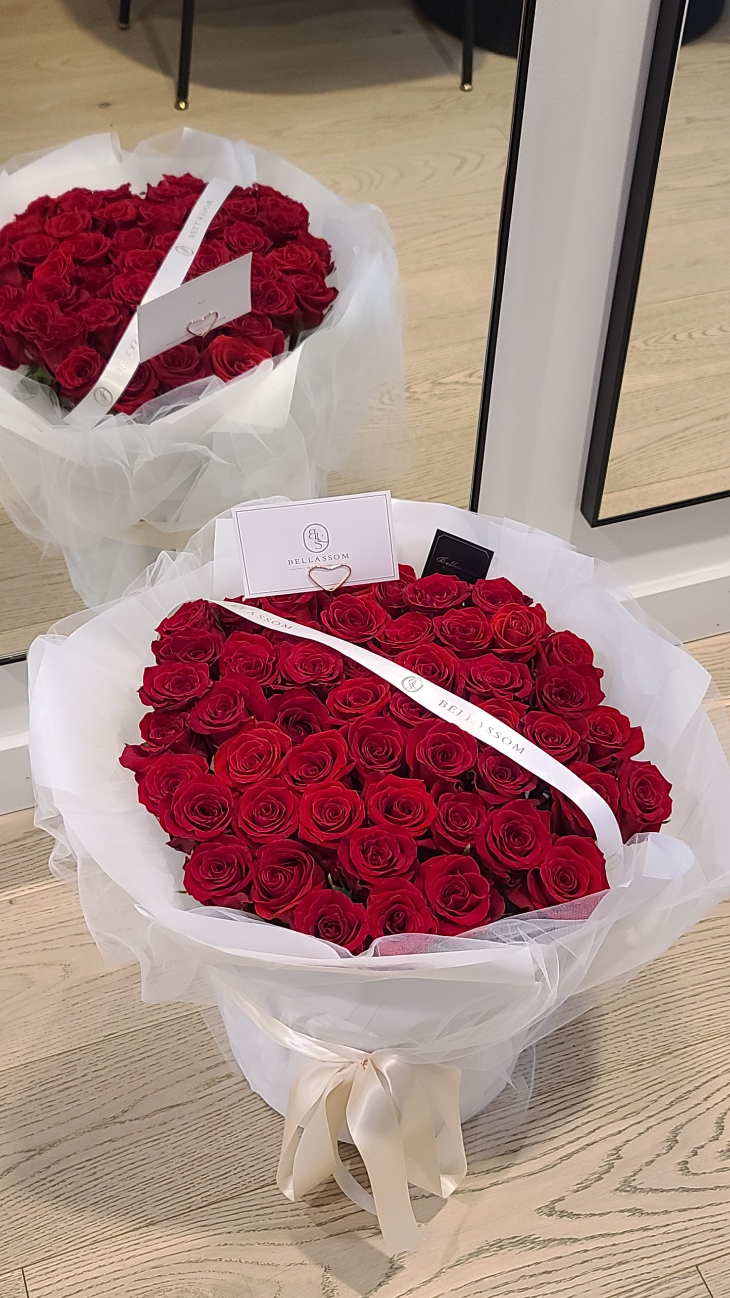 Fifty red roses arranged as a grand romantic gift for special occasions, delivery across Vancouver or Metrotown pick‑up