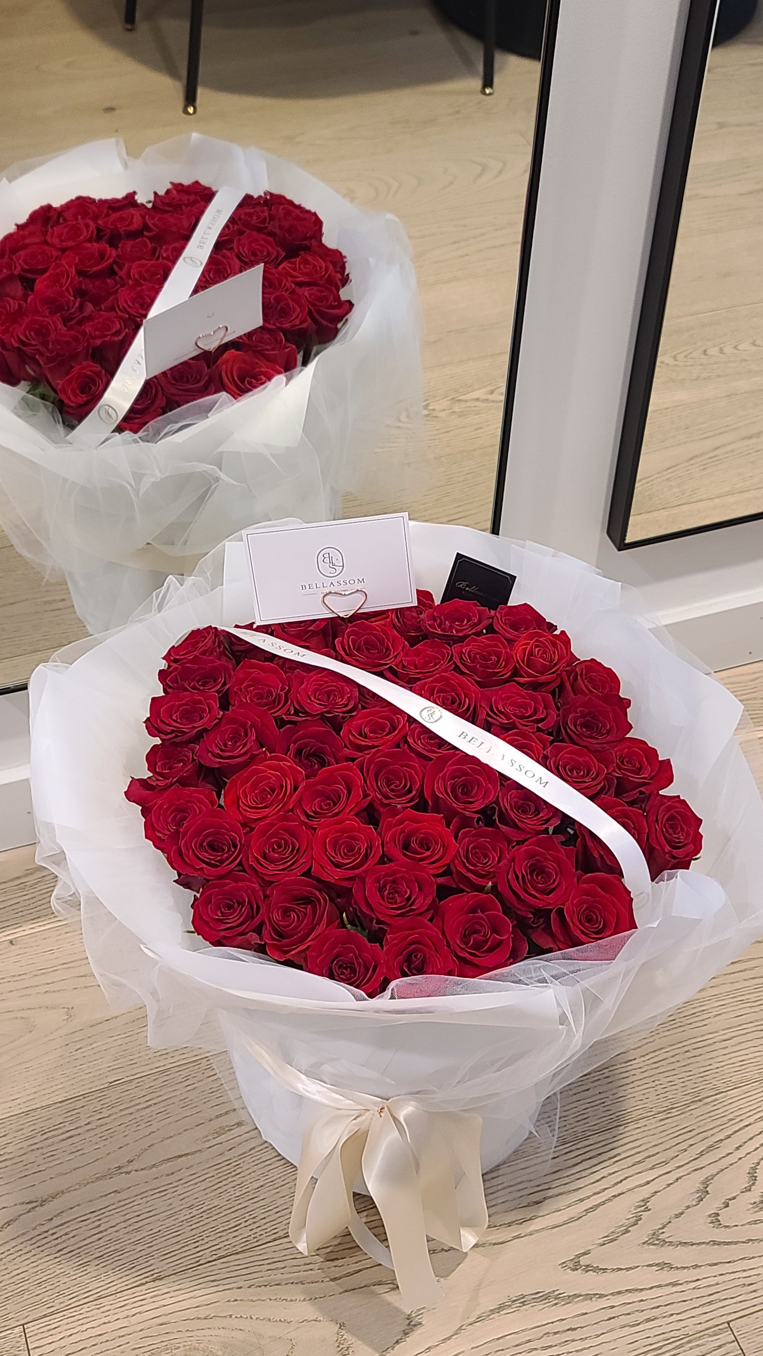 Fifty red roses arranged as a grand romantic gift for special occasions, delivery across Vancouver or Metrotown pick‑up
