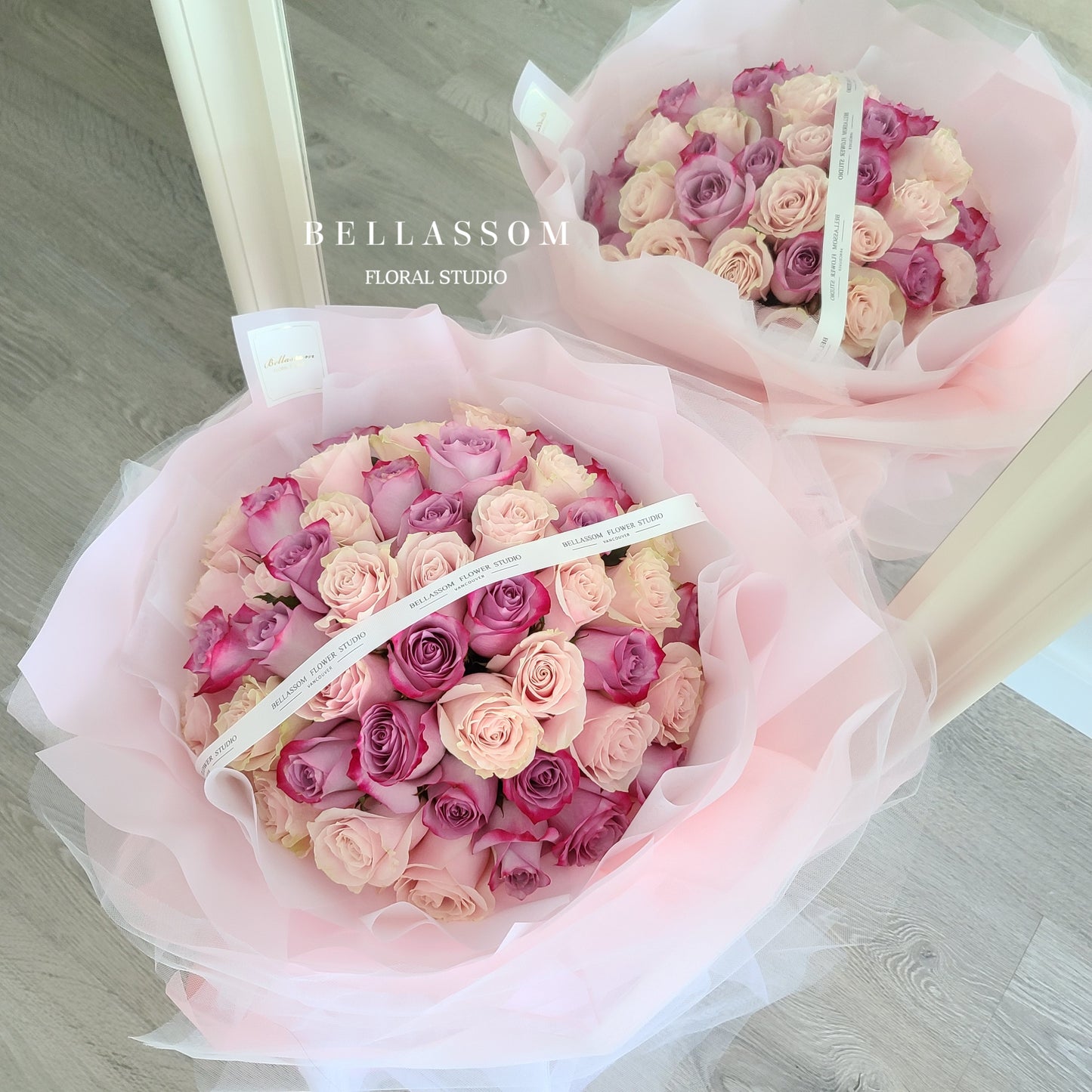 Close‑up of 50 red roses in a large luxury bouquet, perfect for Valentine’s Day, anniversaries, or birthdays, Vancouver delivery & pick‑up available