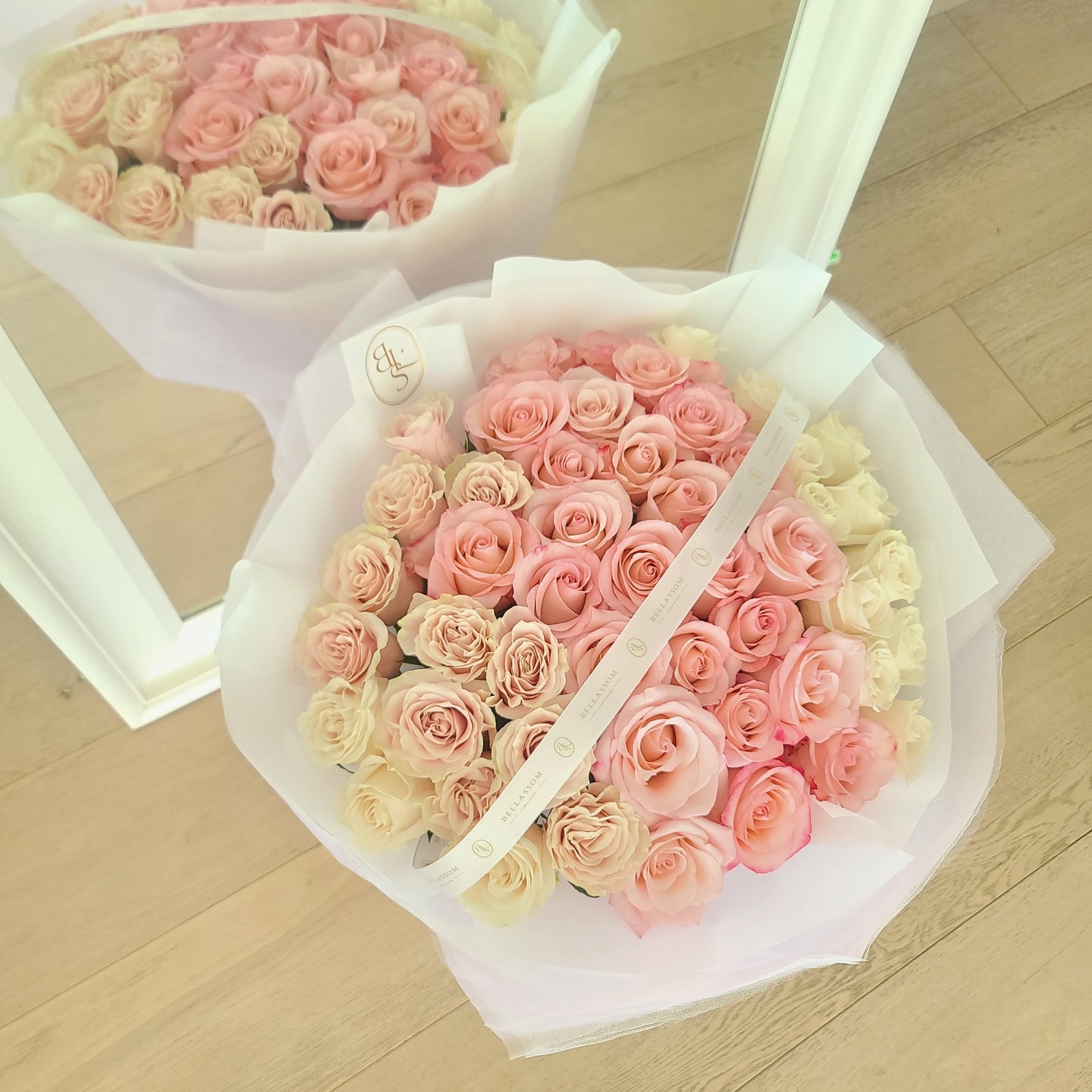 50 Roses Bouquet with fifty premium roses in a grand luxury arrangement, delivery across Vancouver or pick‑up from Metrotown