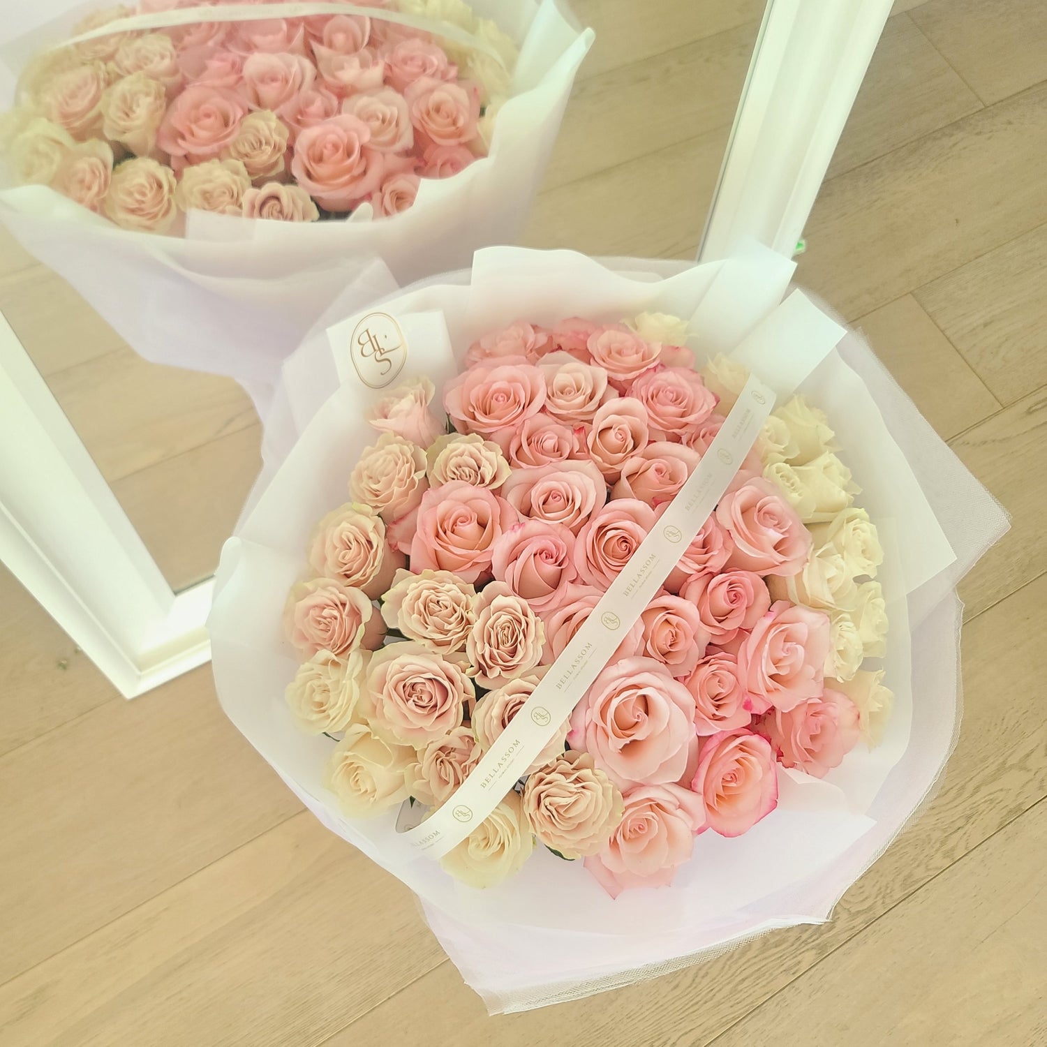 50 Roses Bouquet with fifty premium roses in a grand luxury arrangement, delivery across Vancouver or pick‑up from Metrotown