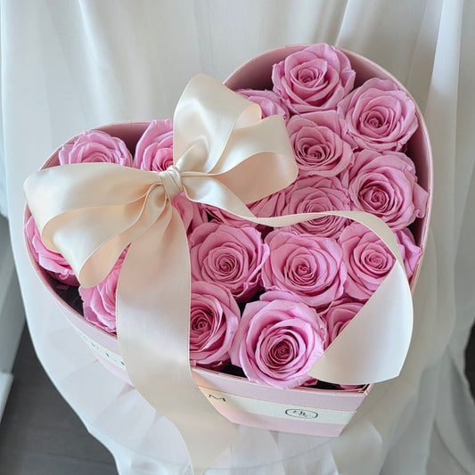 Close-up of preserved roses in Forever Love heart box arrangement