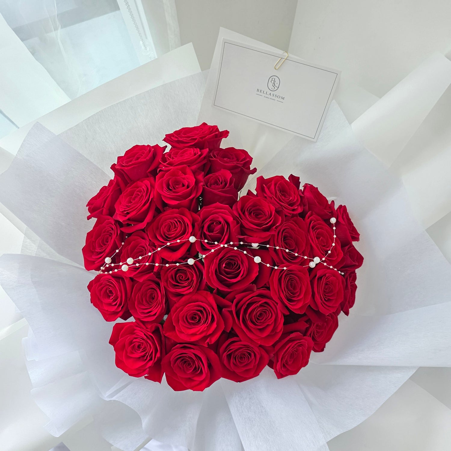 Glamorous 33-rose heart bouquet wrapped in signature Korean luxury style for anniversaries in Vancouver