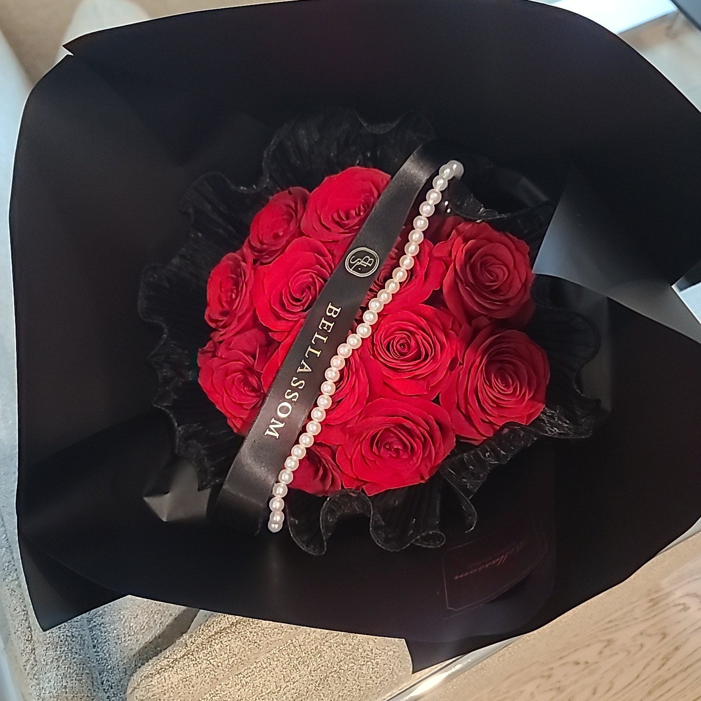 12 Red rose Lace‑Kissed Bouquet with laced pearl string detail for Valentine’s Day and anniversary flower in Vancouver