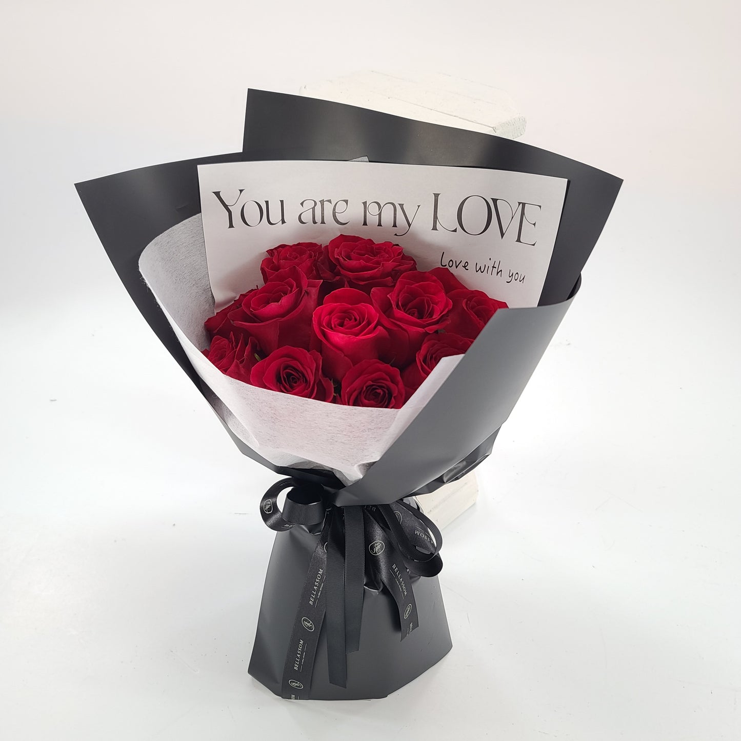 Romantic 12-rose bouquet from Bellassom presented as a Valentine’s Day and anniversary gift in Vancouver