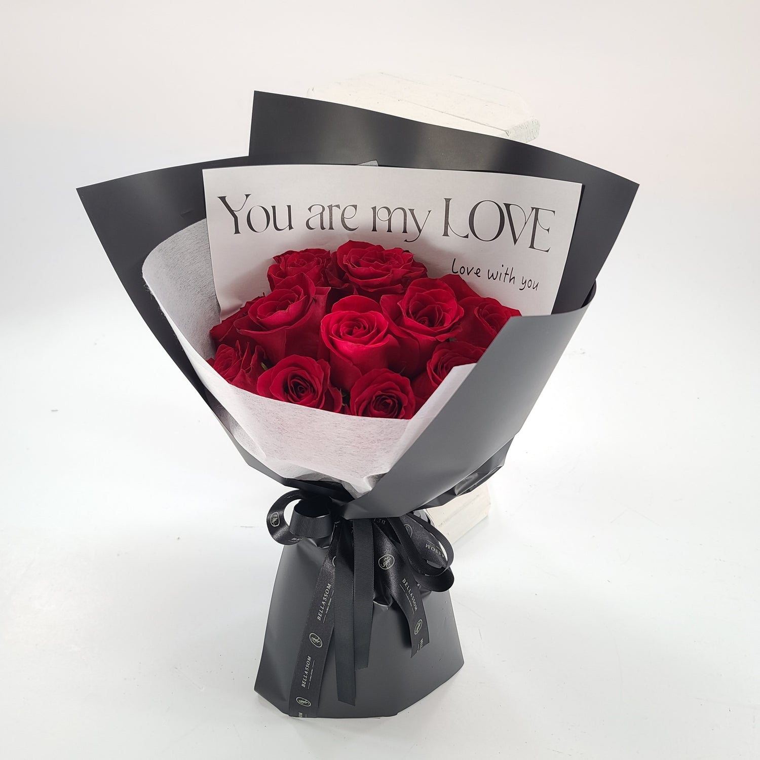 Romantic 12-rose bouquet from Bellassom presented as a Valentine’s Day and anniversary gift in Vancouver