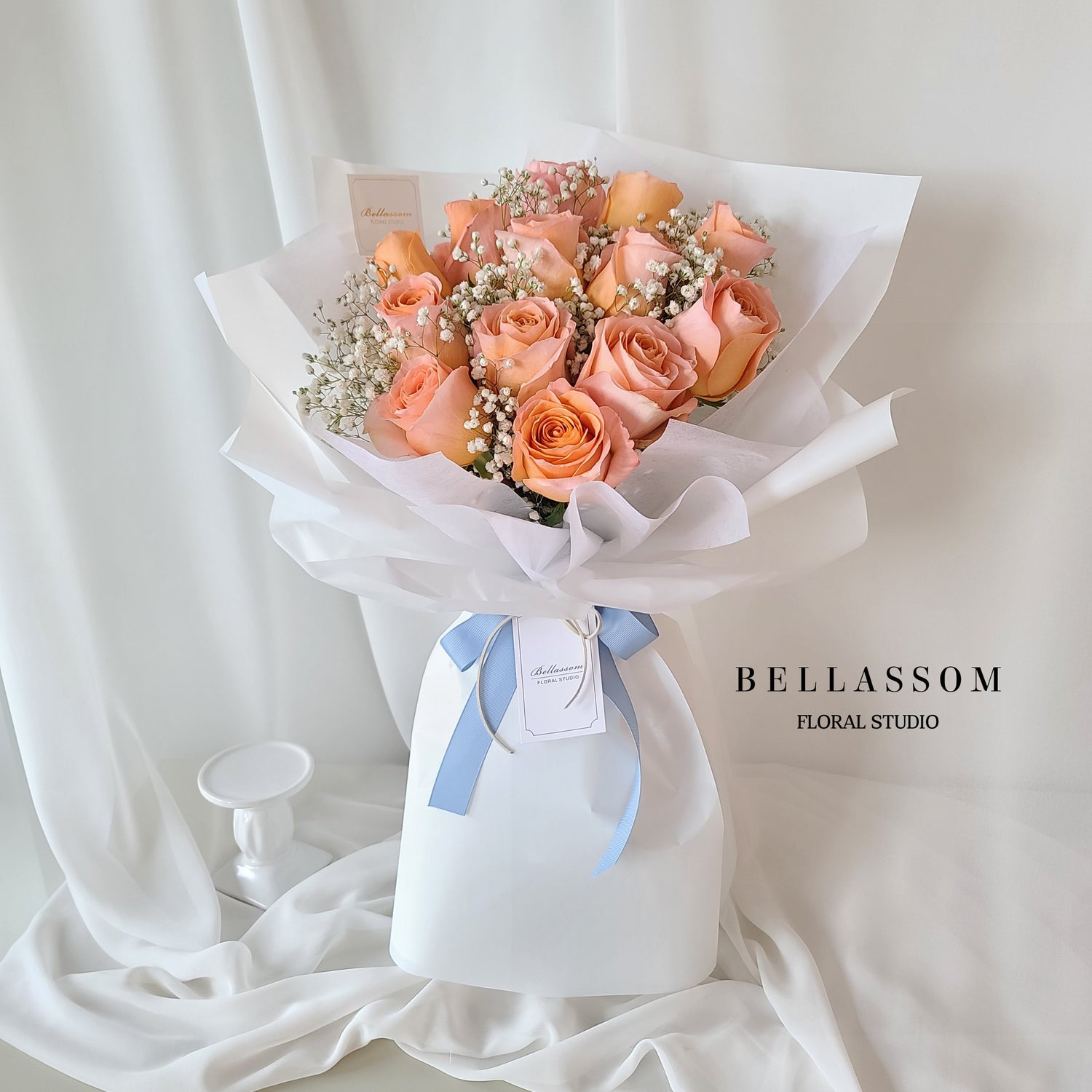 Romantic Rose & Baby’s Breath bouquet in Bellassom’s signature hand-tied wrap, perfect for anniversaries and Valentine’s Day, delivery across Vancouver or pick-up from Metrotown
